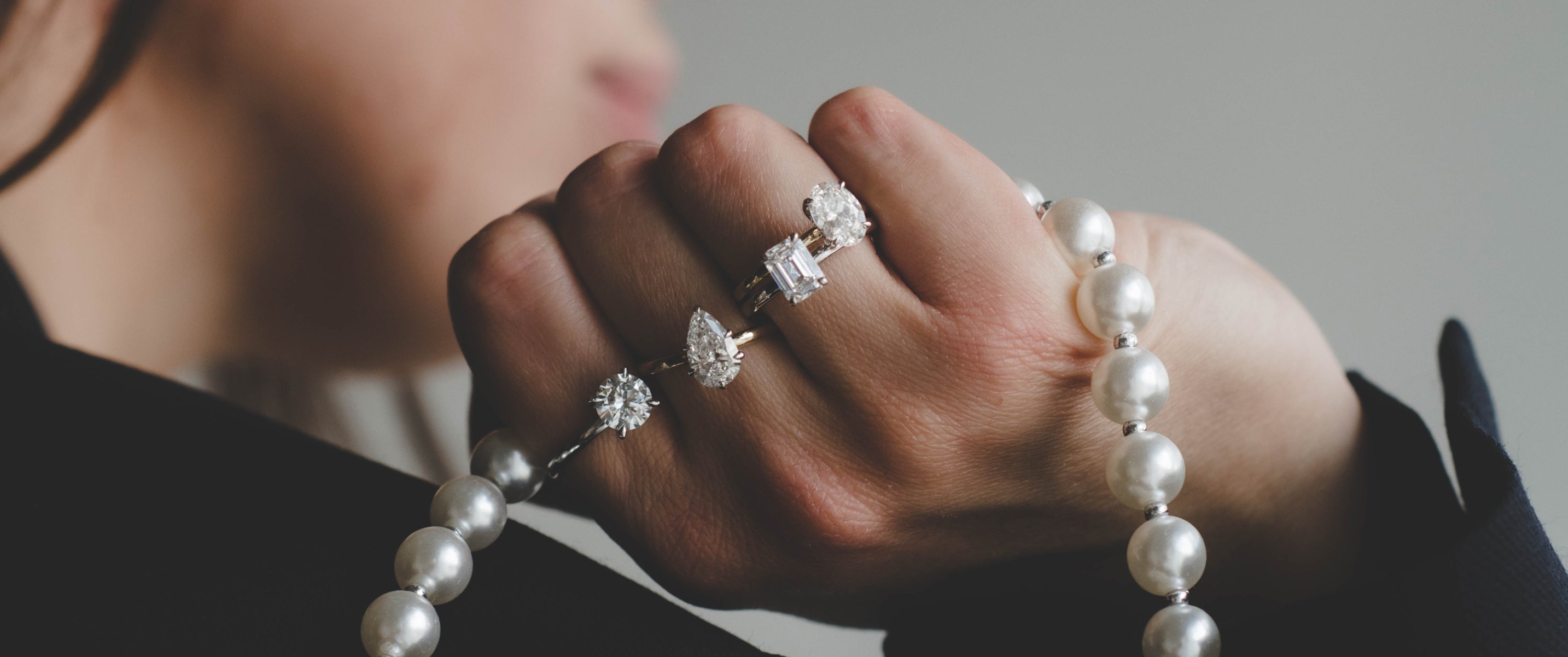 Closeup on Diamond Engagement Ring and Wedding Band
