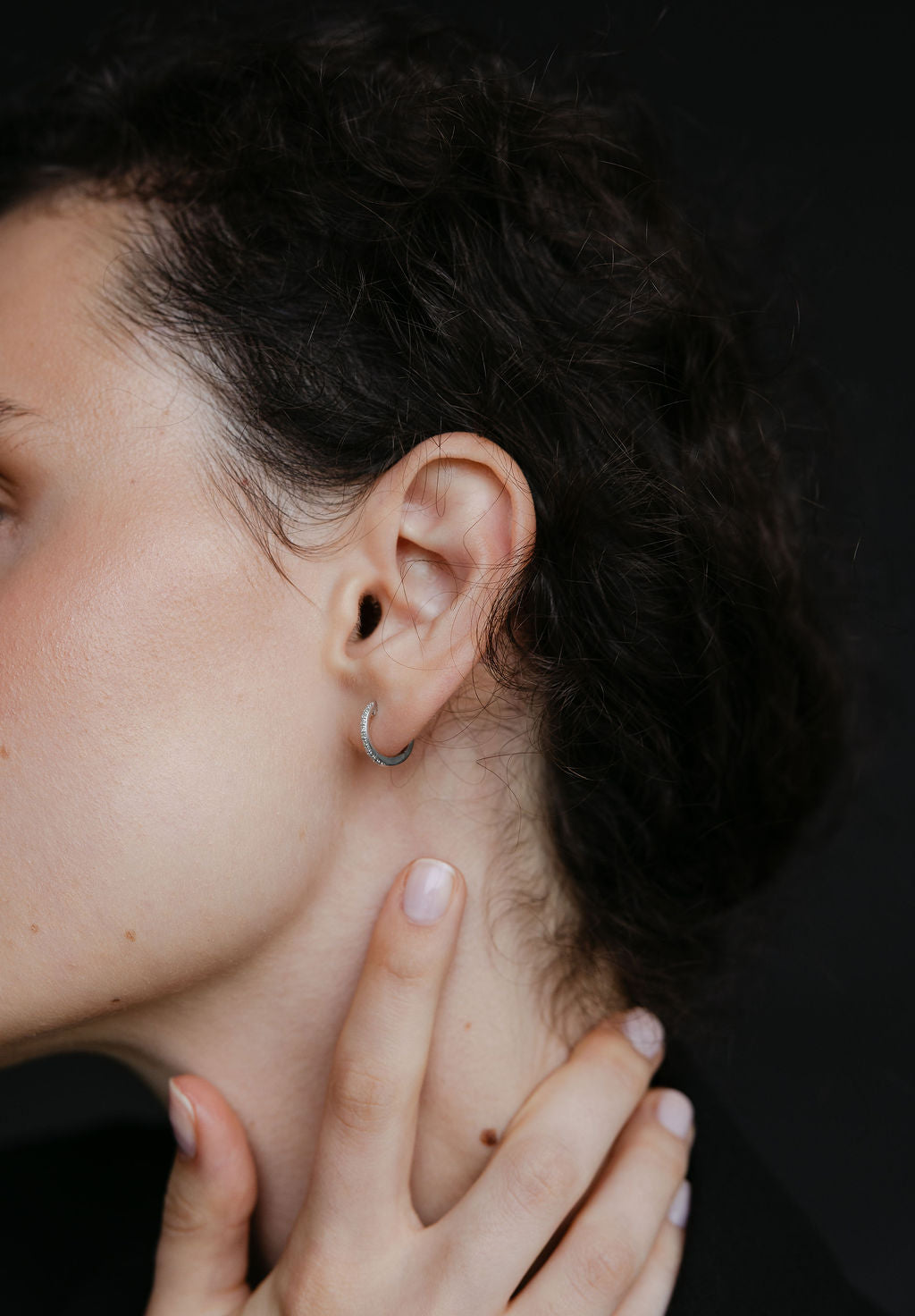 Hoop Earrings with .07 Carat TW of Diamonds in Sterling Silver