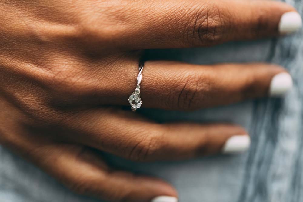 Ring with 4X6MM Oval Aquamarine and .06 Carat TW of Diamonds in 10kt White Gold