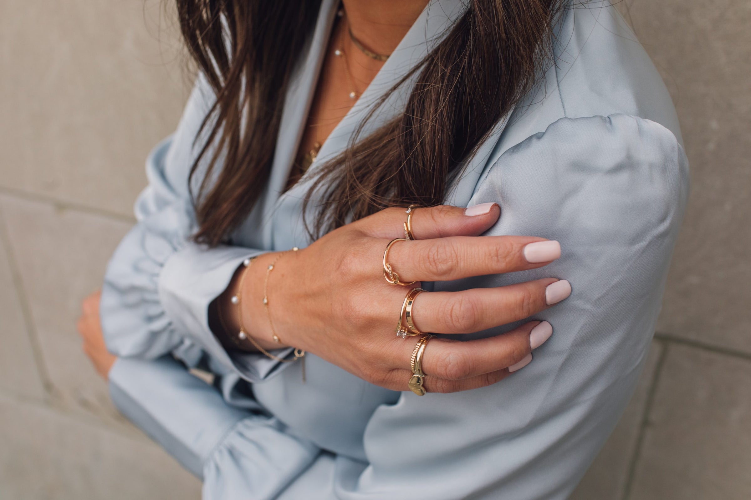 Love Knot Ring with .04 Carat TW of Diamonds in 10kt Yellow Gold