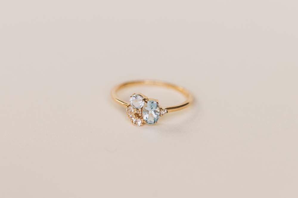 Oval Blue Topaz, Round Aquamarine Ring
