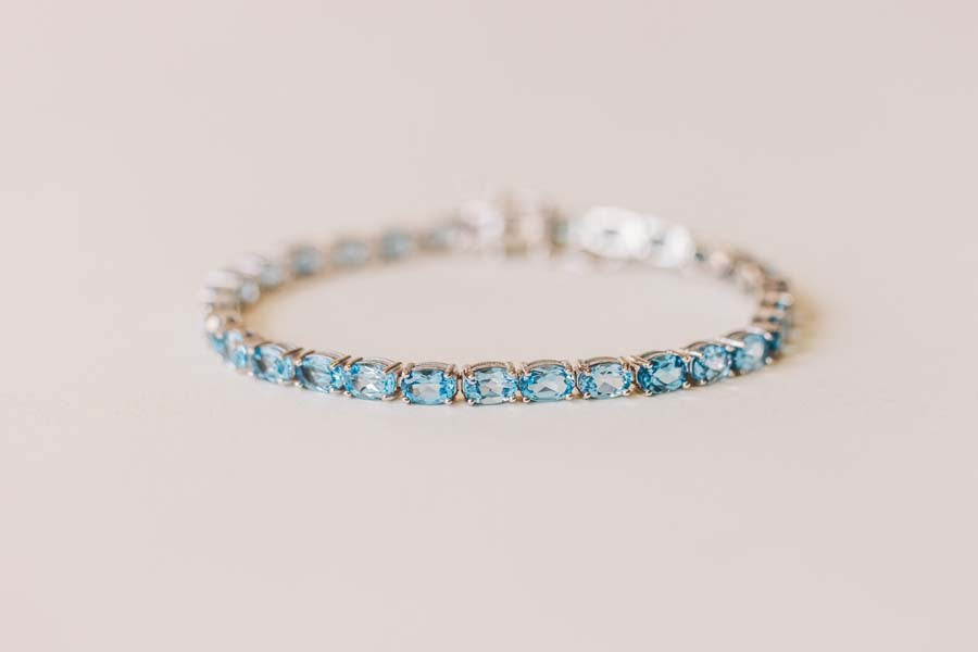 7.5" Tennis Bracelet with Blue Topaz in Sterling Silver