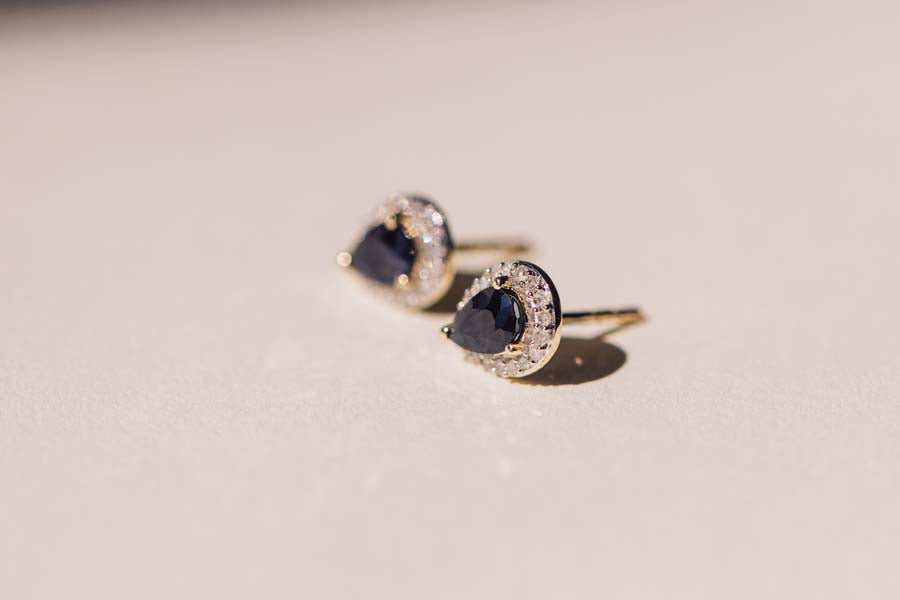 Halo Earrings with .17 Carat TW of Diamonds and 6x4MM Pear Shape Blue Sapphire in 10kt Yellow Gold