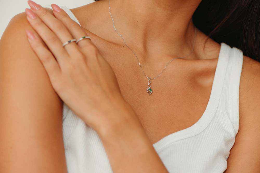 Pendant with Emerald and .05 Carat TW of Diamonds in 10kt White Gold