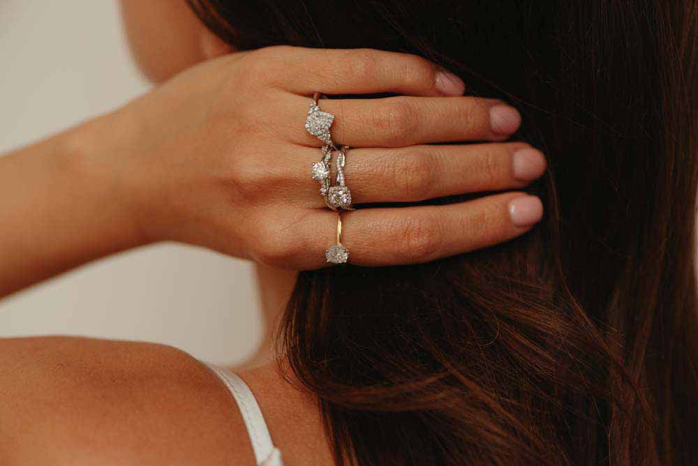 Colourless Collection Halo Engagement Ring with .70 Carat TW of Diamonds in 18kt White Gold