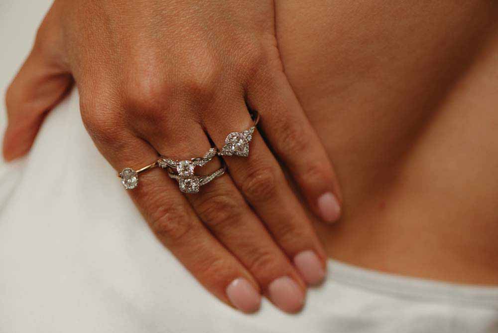 Colourless Collection Halo Engagement Ring with .74 Carat TW of Diamonds in 18kt White Gold
