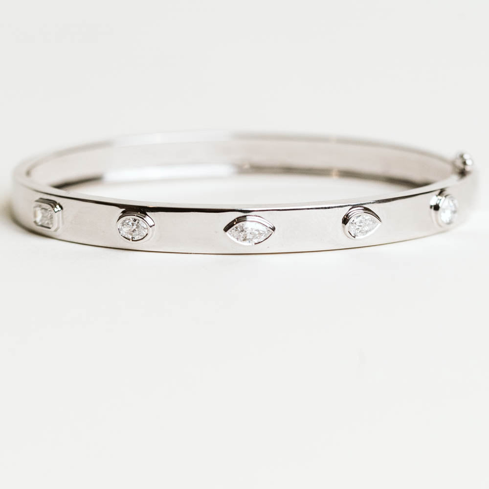 Multi-Shaped Diamond Bangle with 1.20 Carat TW of Lab Created Diamonds in 14KT White Gold