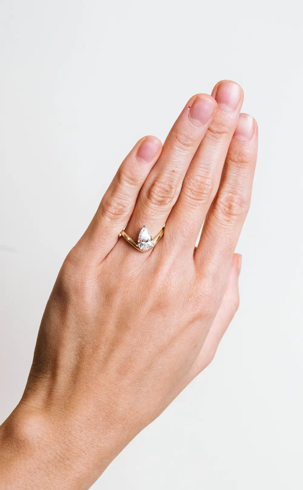 Pear Shaped Engagement Ring with 1.50 Carat Lab Created Diamond in 14KT Yellow Gold