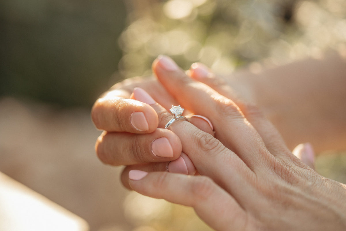 Northern Facet Ideal Cut Solitaire Engagement Ring, crafted in 18kt White Gold and featuring a dazzling 1.00 Carat Diamond at its center
