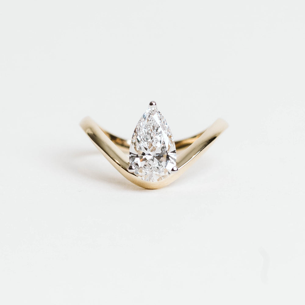 Pear Shaped Engagement Ring with 1.50 Carat Lab Created Diamond in 14KT Yellow Gold