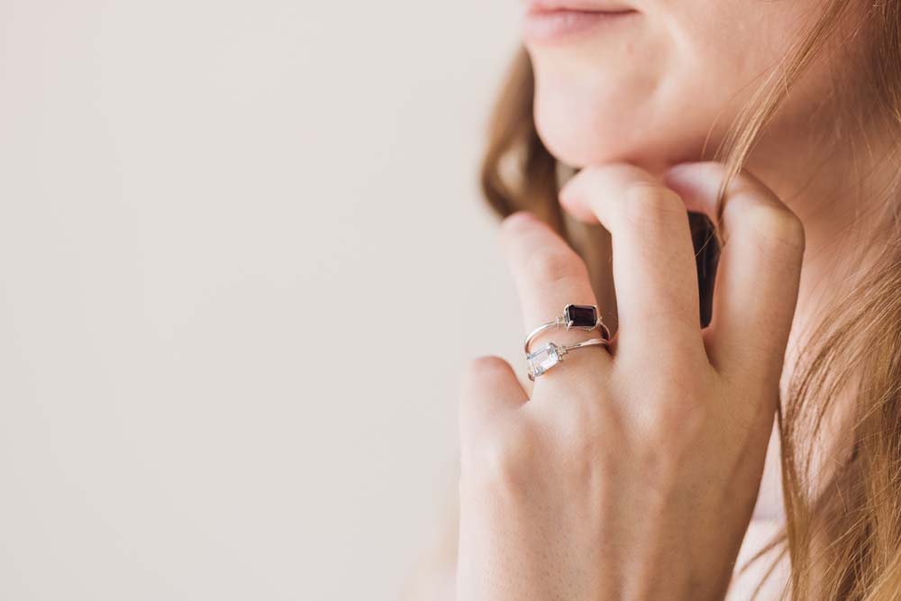 Emerald Cut Garnet Ring with .07 Carat TW of Diamonds in 10kt White Gold