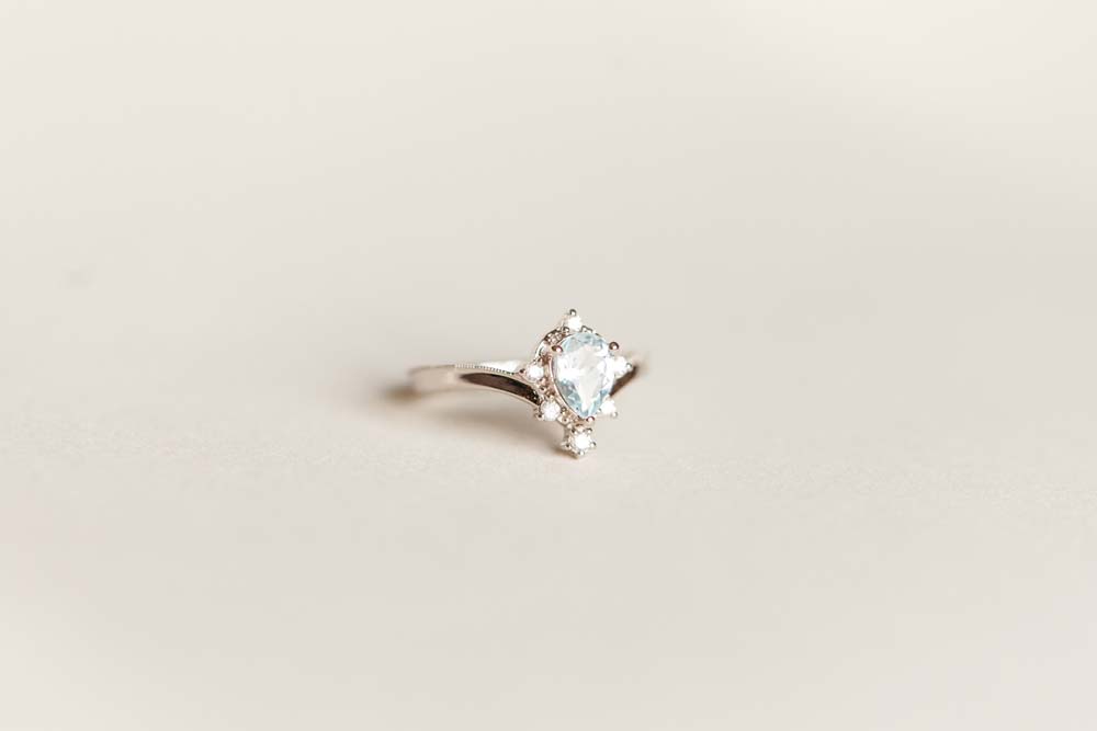 Ring with 7X5MM Aquamarine and .10 Carat TW of Diamonds in 14kt White Gold