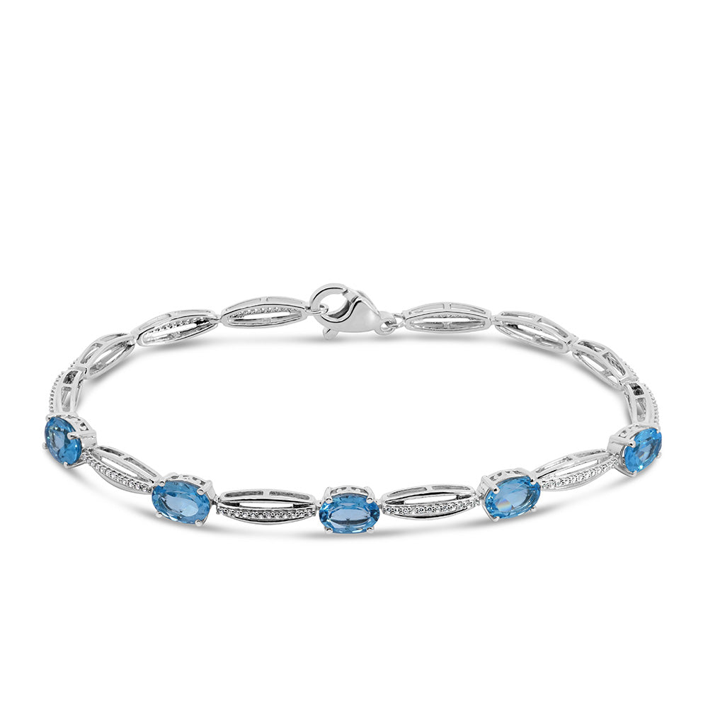 Tennis Bracelet with 7x5MM Blue Topaz and Cubic Zirconia