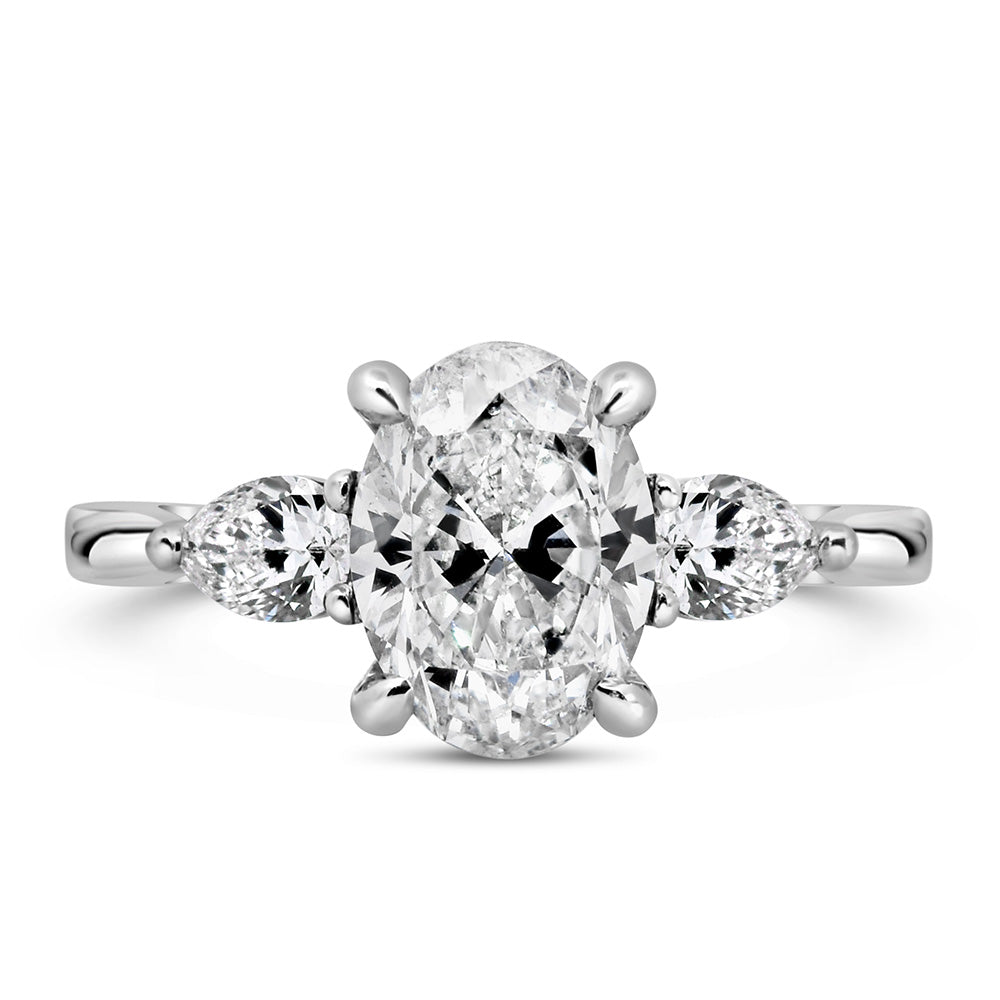 Oval Trilogy Engagement Ring with 2.56 Carat TW of Diamonds in 18kt White Gold