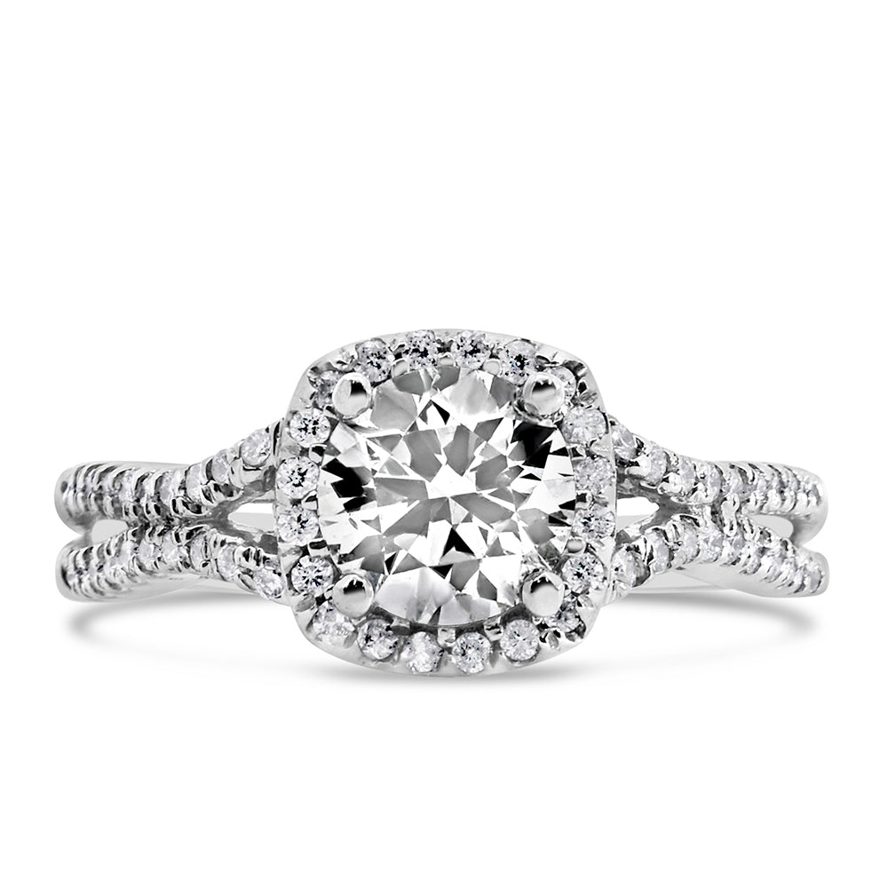 Northern Facet Ideal Cut Halo Engagement Ring, crafted in 18kt White Gold and adorned with a total of 1.30 Carats of sparkling Diamonds