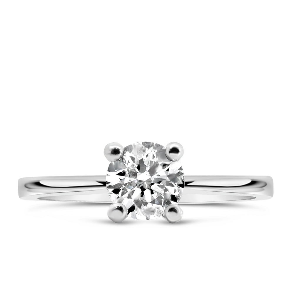 Northern Facet Ideal Cut Halo Engagement Ring, crafted in 18kt White Gold and featuring a dazzling .70 Carat Diamond at its center