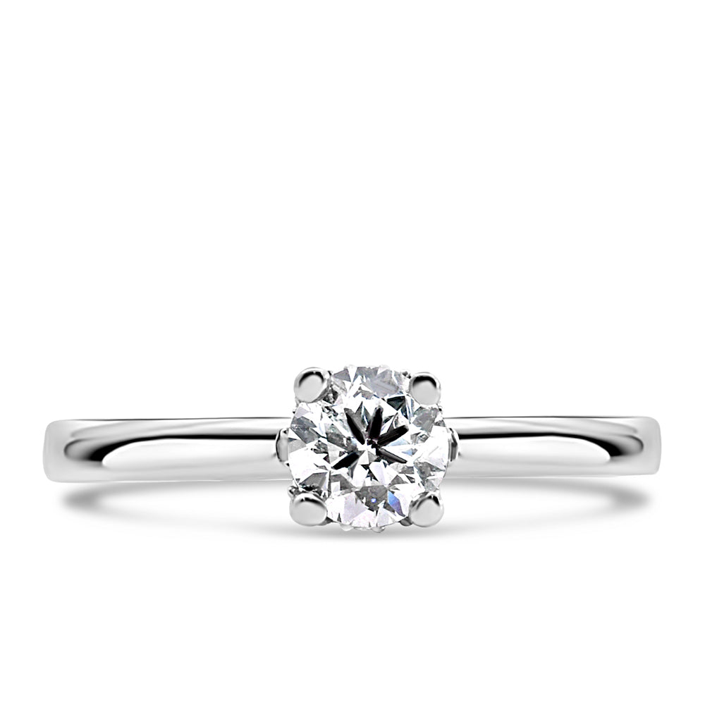 stunning Colourless Collection Solitaire Engagement Ring crafted in 18kt White Gold, adorned with a total of .54 Carat of sparkling Diamonds