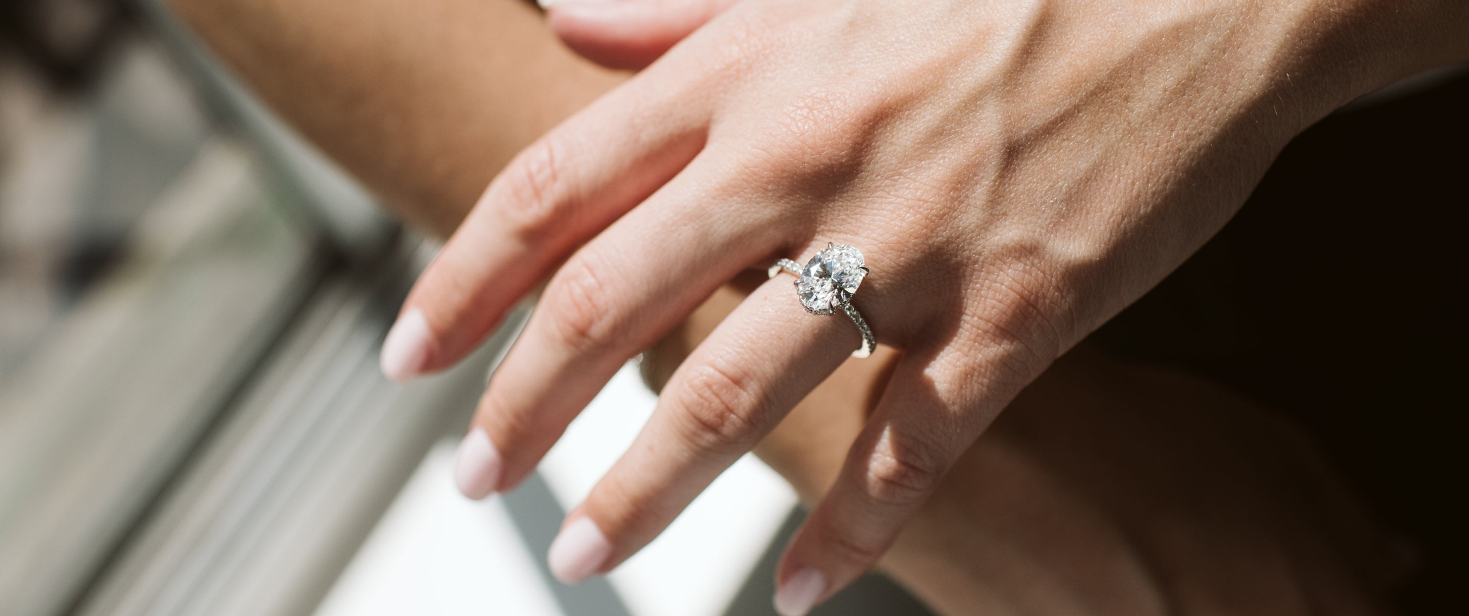 Close Up Hidden Halo Oval Engagement Ring