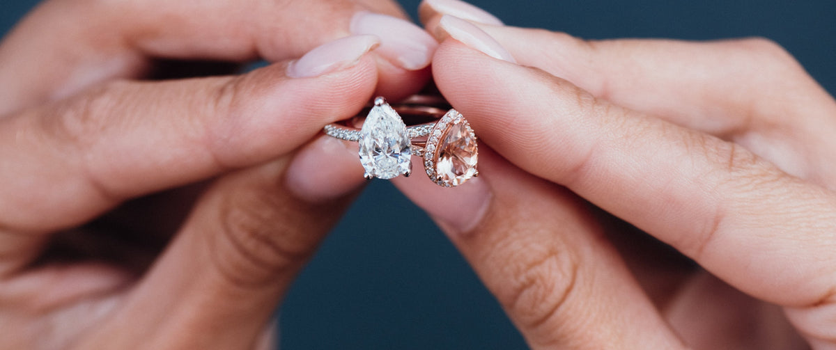 Close Up on Diamond and Morganite Pear Shaped Engagement Rings