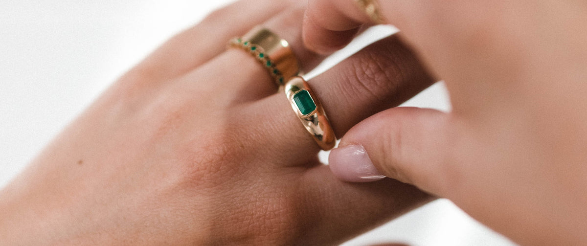 Close Up Promise Ring with Emerald and Yellow Gold
