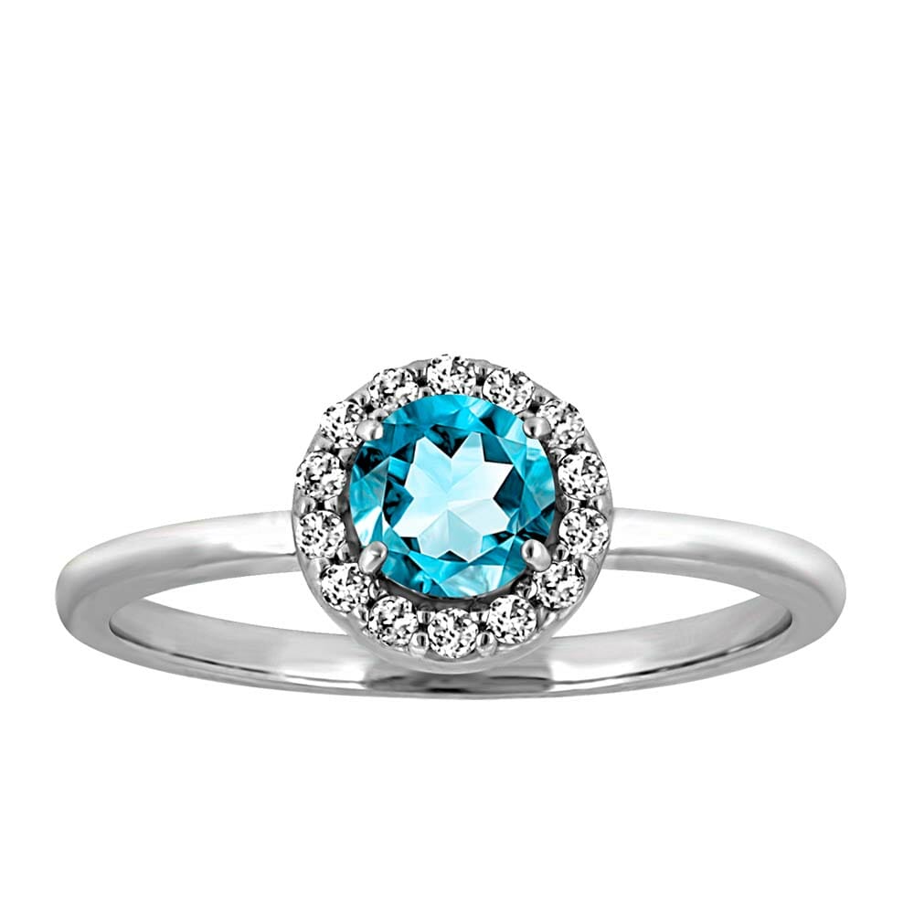 Ring with Genuine Blue Topaz and Cubic Zirconia in Sterling Silver