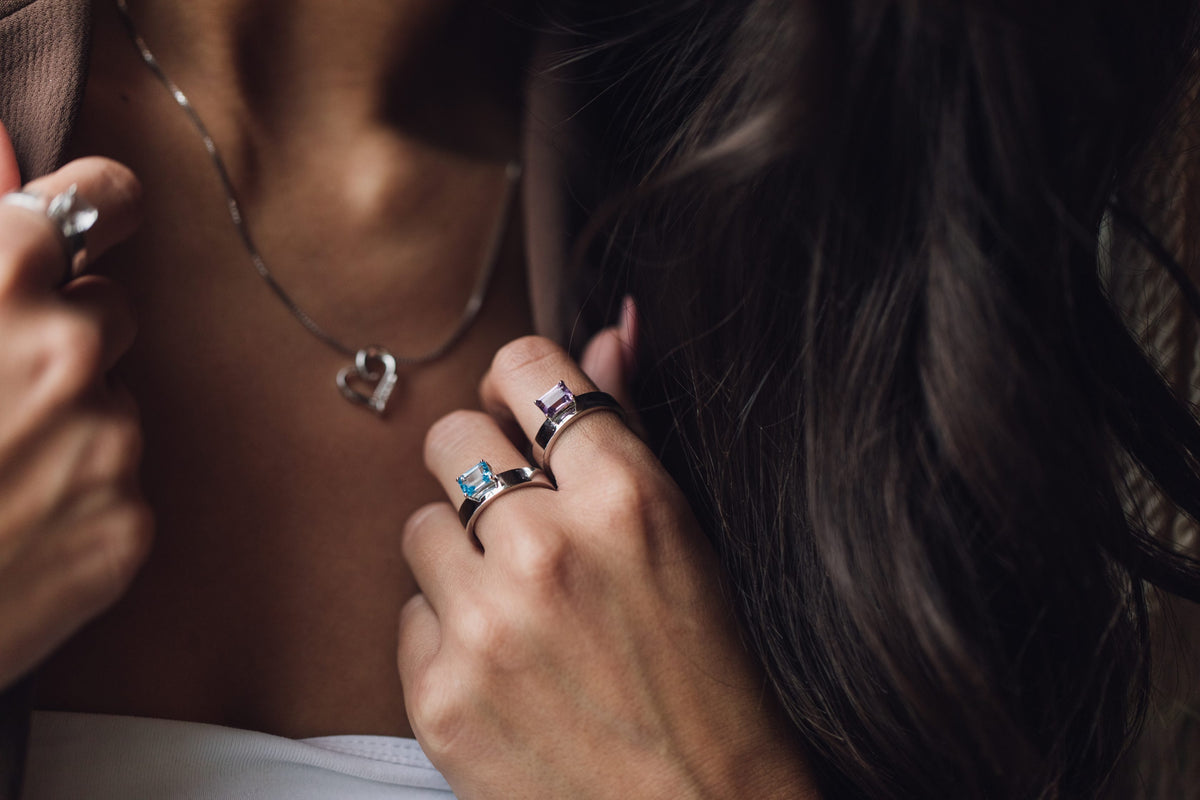 Ring with Emerald Cut Swiss Blue Topaz in Sterling Silver