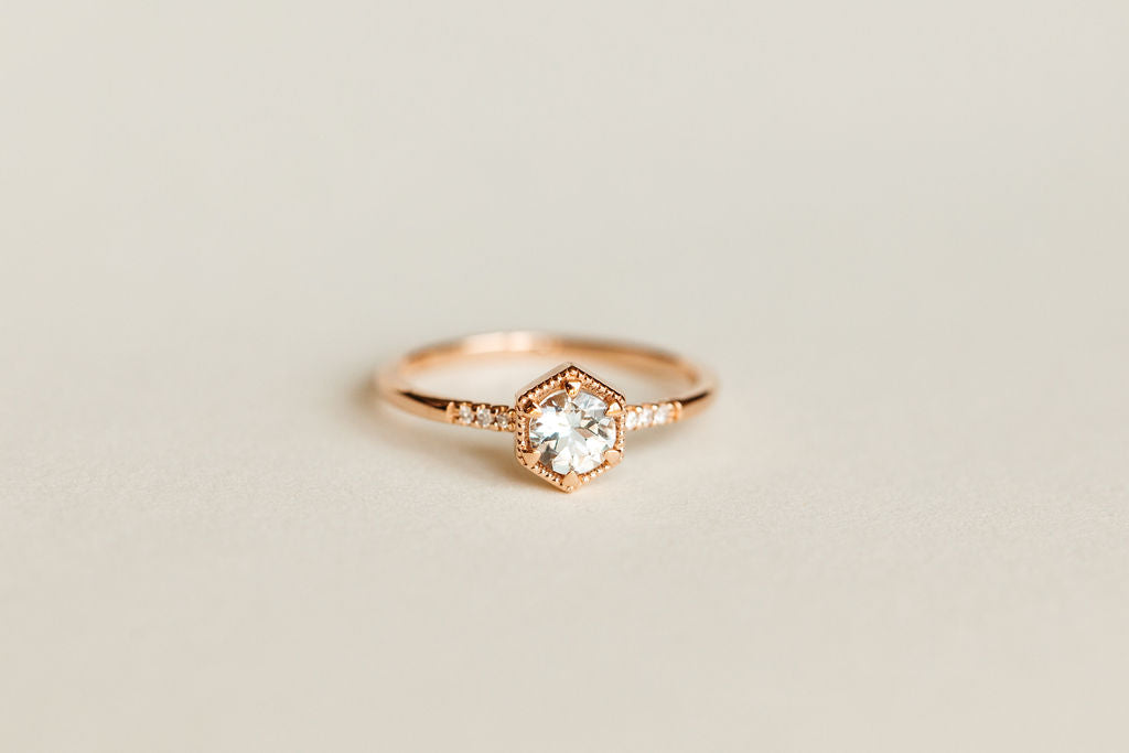 Ring with 5MM Aquamarine and .03 Carat TW of Diamonds in 10kt Rose Gold