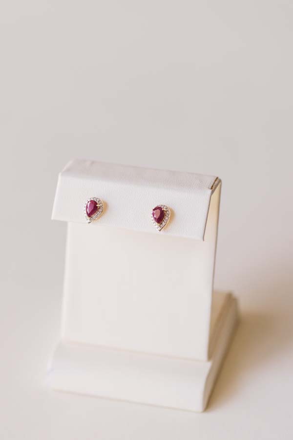 Halo Earrings with .17 Carat TW of Diamonds and 6x4MM Pear Shape Ruby in 10kt Yellow Gold