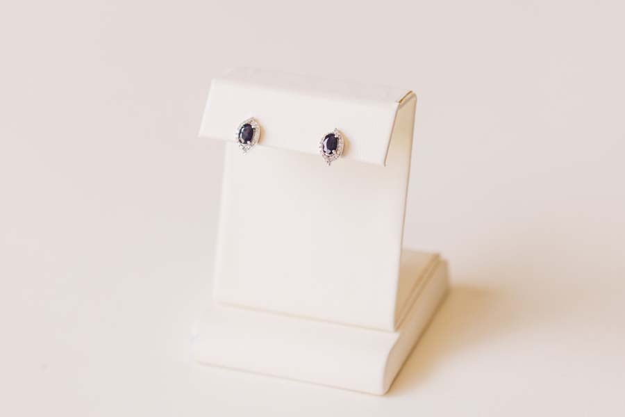 Halo Earrings with .17 Carat TW of Diamonds and 6x4MM Oval Blue Sapphire in 10kt White Gold