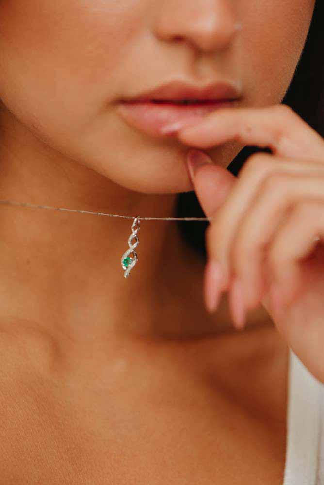Pendant with Emerald and .05 Carat TW of Diamonds in 10kt White Gold