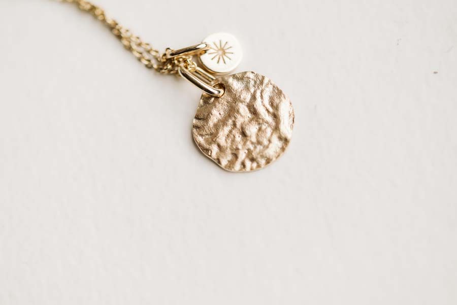 a gold necklace