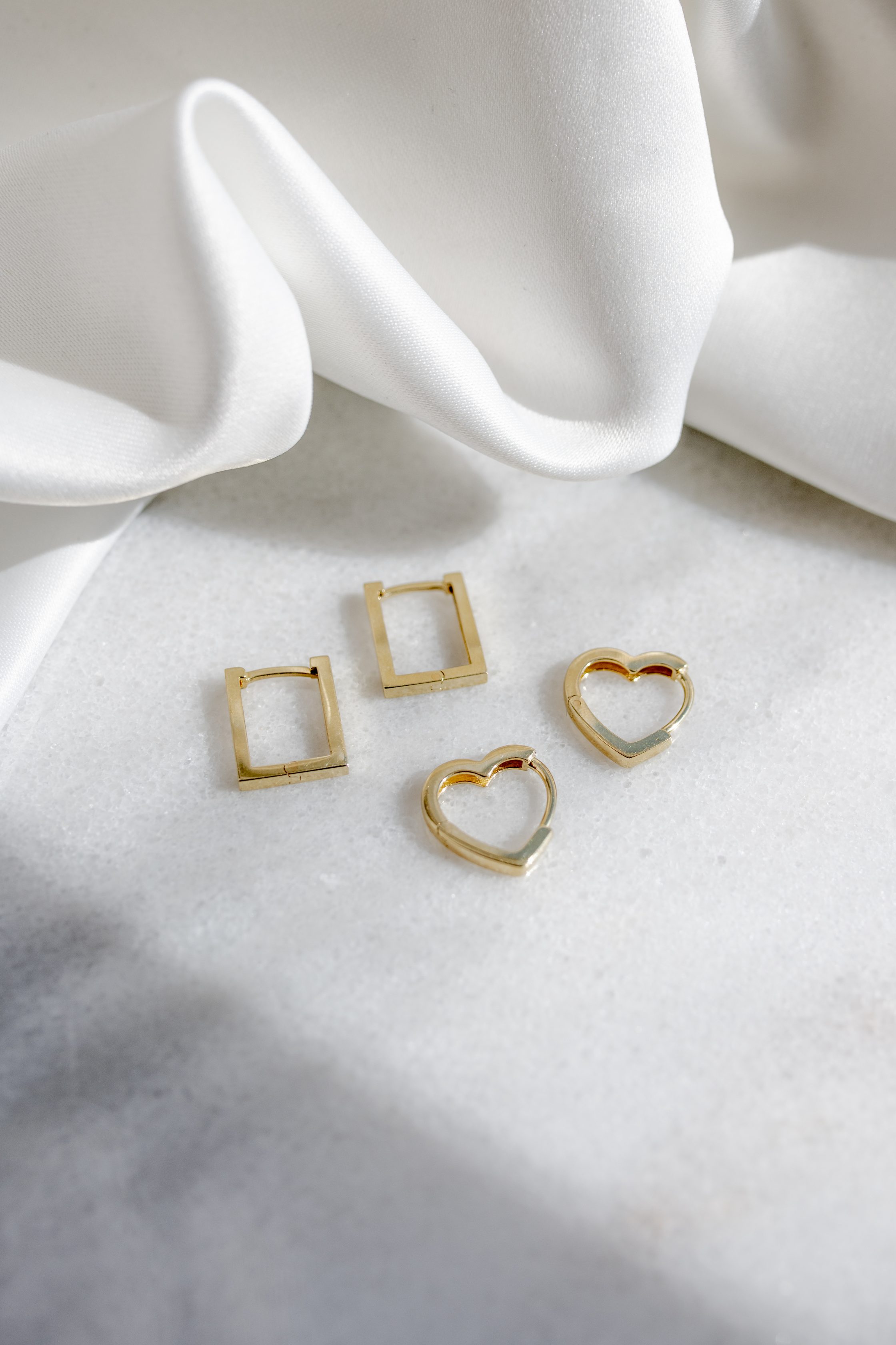 13.5MM Heart Huggies Hoop Earrings in 10kt Yellow Gold