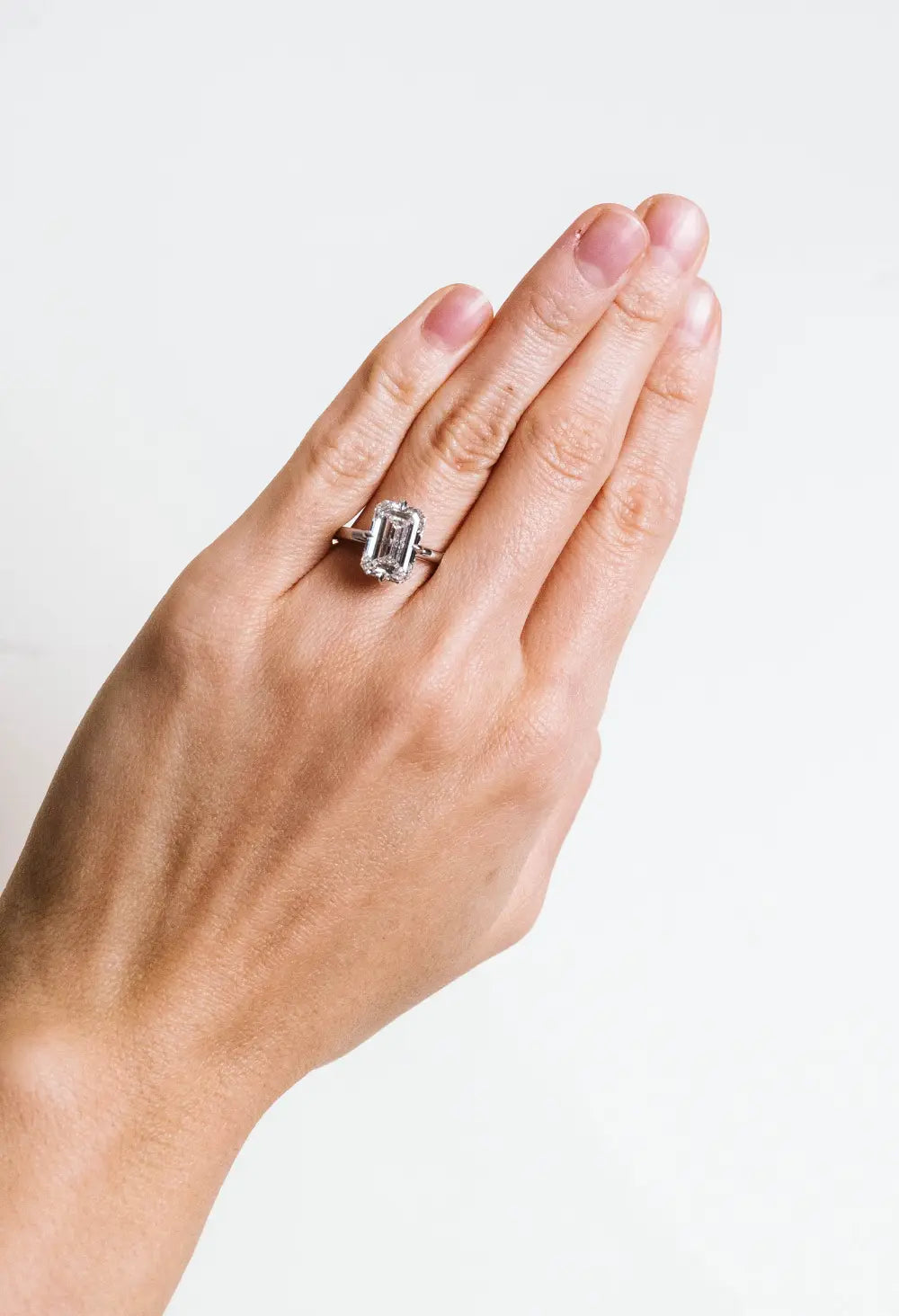 Emerald Cut Hidden Halo Engagement Ring with 4.70 Carat TW of Lab Created Diamonds in 14KT White Gold