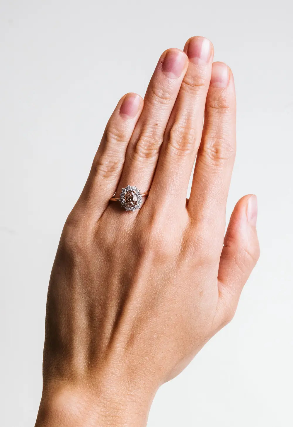 7X5MM Oval Morganite Ring with .40 Carat TW of Diamonds in 14kt Rose Gold