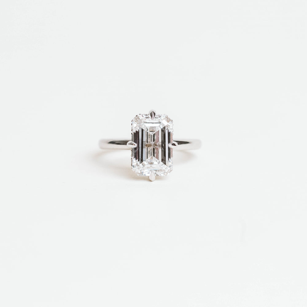 Emerald Cut Hidden Halo Engagement Ring with 4.70 Carat TW of Lab Created Diamonds in 14KT White Gold