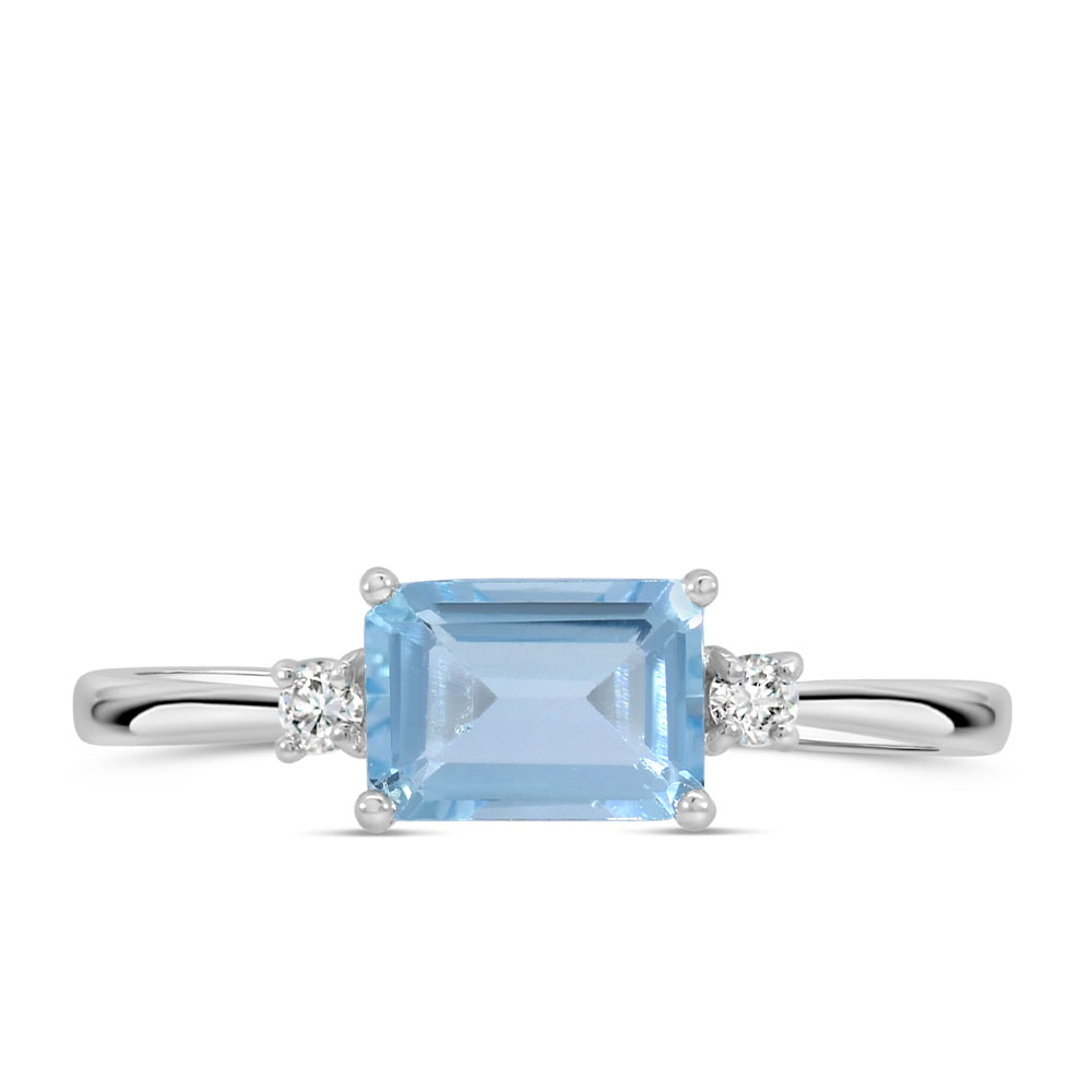 Emerald Cut Blue Topaz Ring with .07 Carat TW of Diamonds in 10kt White Gold