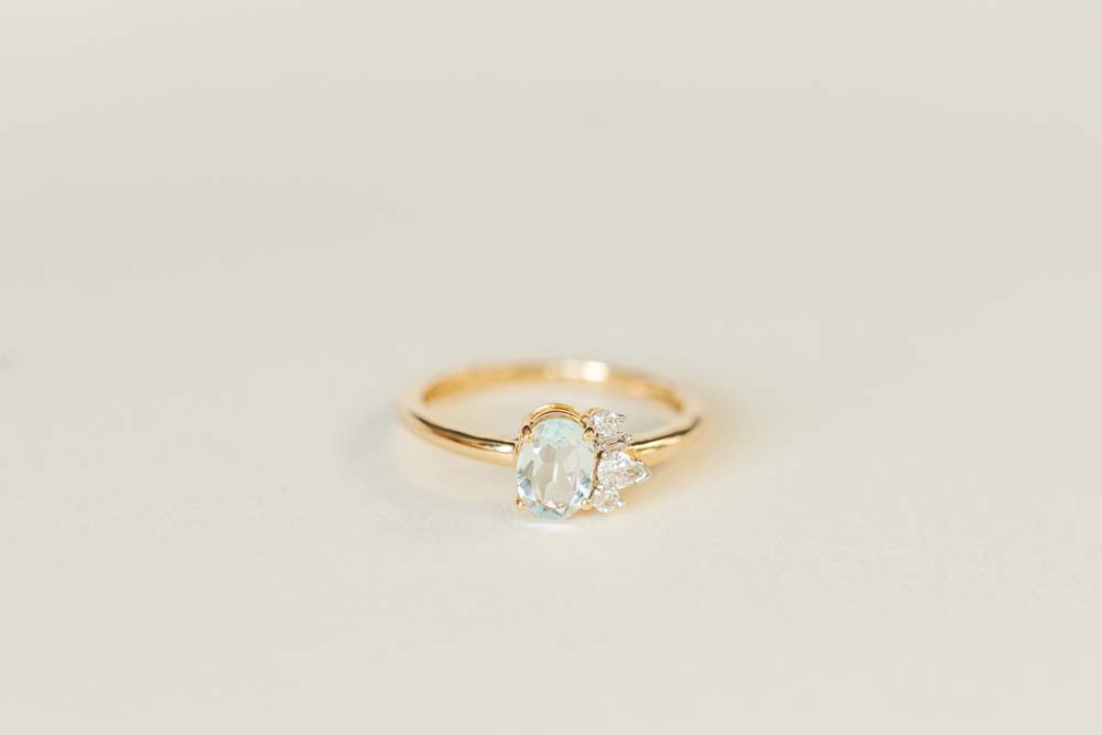 Ring with Oval 7X5MM Aquamarine and .20 Carat TW of Diamonds in 14kt Yellow Gold