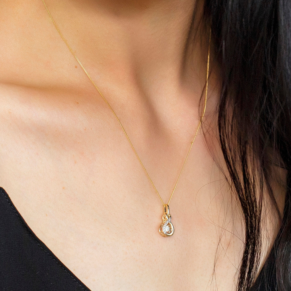 Luminance Canadian Diamond Pendant with .14 Carat TW of Diamonds in 10kt Yellow Gold With Chain