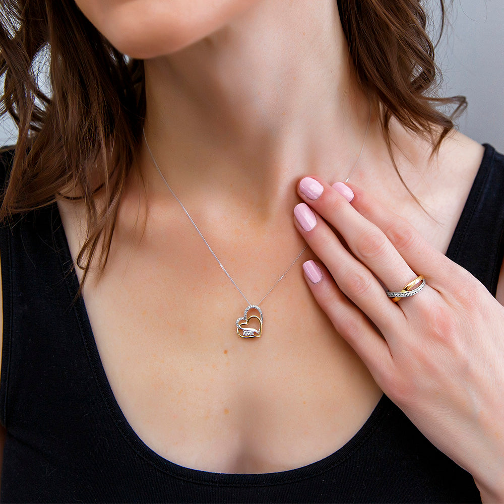 Heart Pendant with .13 Carat TW of Diamonds in 10kt White and Yellow Gold with Chain