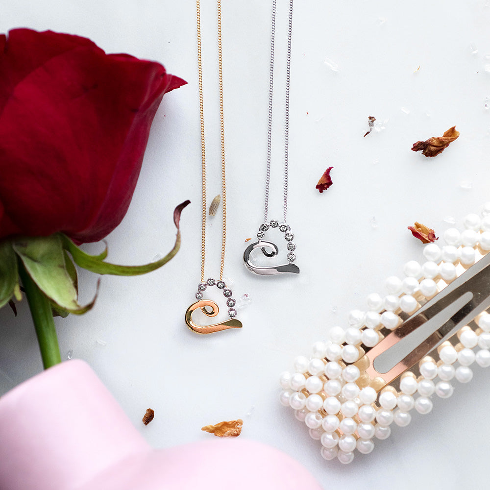 Heart Pendant with .05 Carat TW of Diamonds in 10kt White Gold with Chain