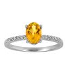 Ring with .07 Carat TW of Diamonds and Citrine in 10kt White Gold