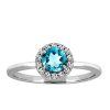 Ring with Genuine Blue Topaz and Cubic Zirconia in Sterling Silver