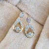Earrings with .10 Carat TW of Diamonds in 10kt Yellow Gold
