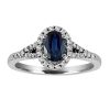 Ring with .20 Carat TW of Diamonds and Blue Sapphire in 10kt White Gold