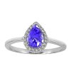 Ring with .09 Carat TW of Diamonds and Tanzanite in 10kt White Gold