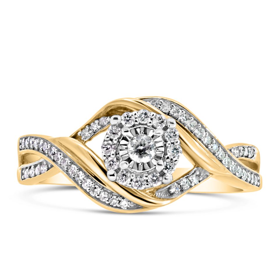 Beautiful engagement ring featuring sparkling diamonds totaling 0.20 carats set in stunning 10kt yellow gold