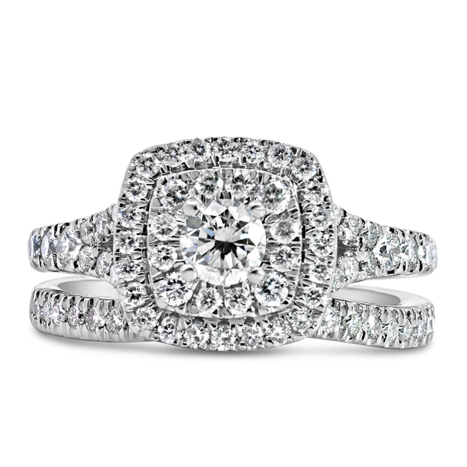 Gorgeous engagement ring adorned with shimmering diamonds totaling 1.25 carats, set in luxurious 14kt white gold