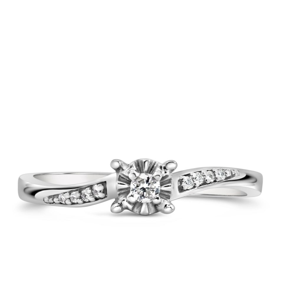 Stunning engagement ring featuring delicate diamonds totaling 0.07 carats, set in elegant 10kt white gold