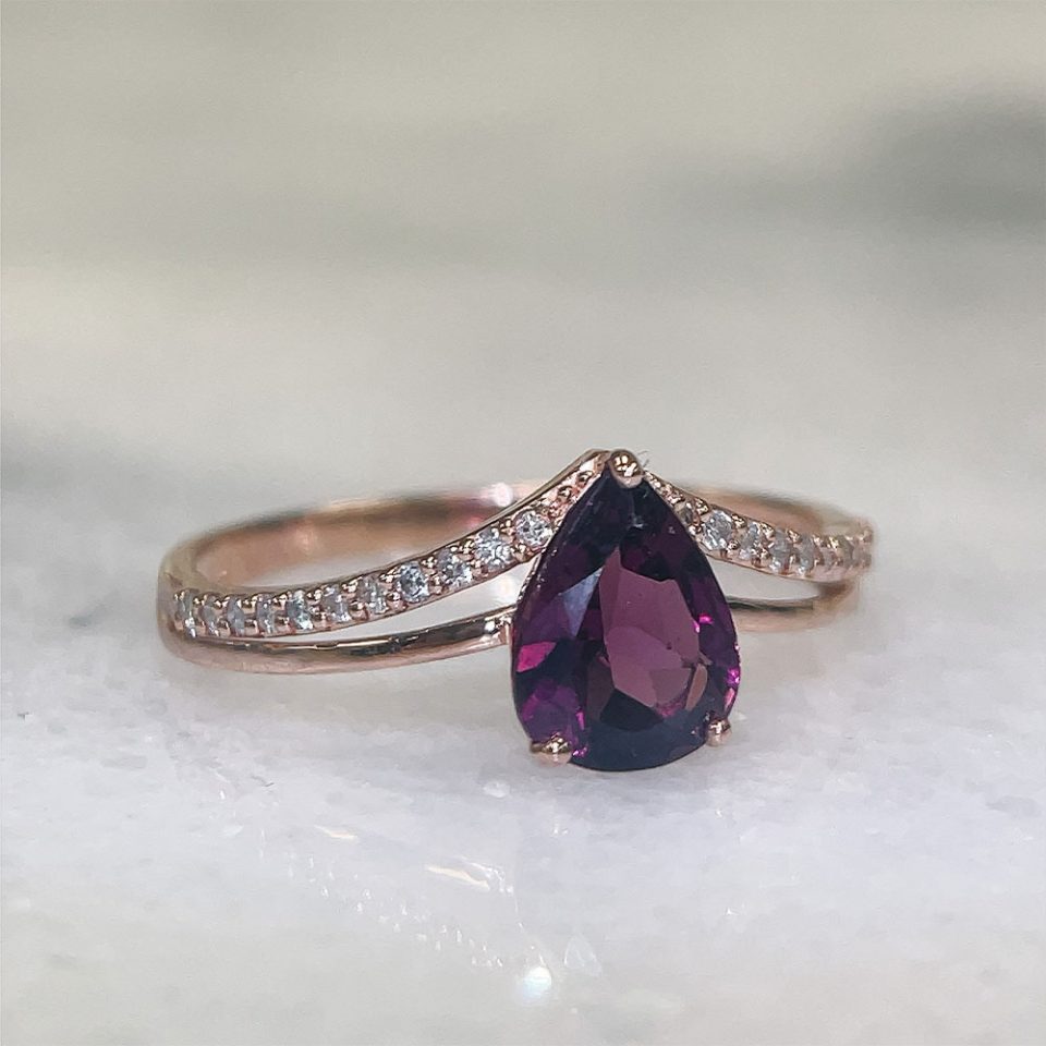 Ring With 8X6MM Pear Shape Rhodolite Garnet And .11 Carat TW Of Diamonds In 10kt Rose Gold