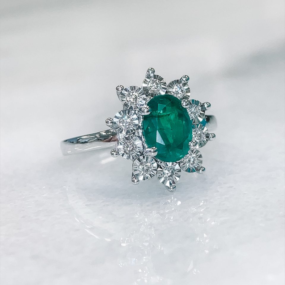 Ring with 8X6MM Oval Emerald and .18 Carat TW of Diamonds in 14kt White Gold